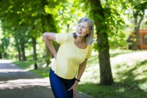 senior-woman-jogger-in-pain-and-needing-sciatica-treatment