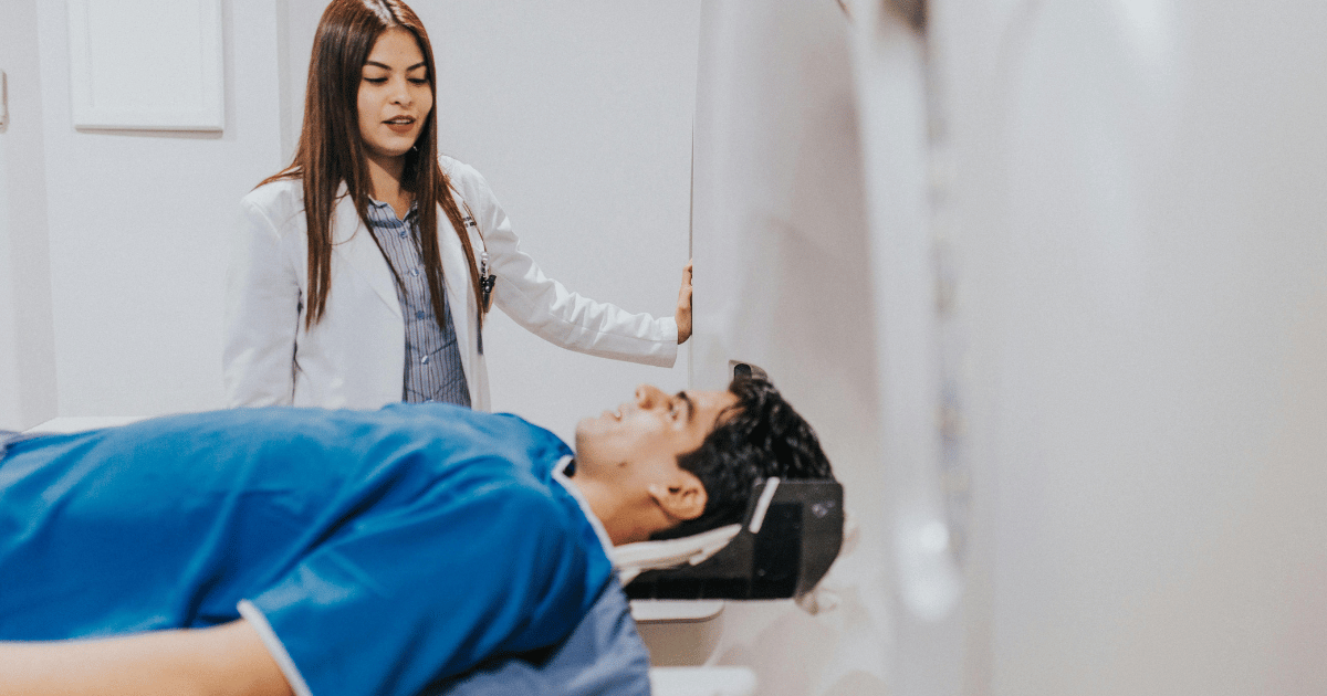 Patient undergoing MRI scan for back pain diagnosis