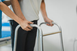 Patient recovering from microdiscectomy surgery during physical therapy rehabilitation